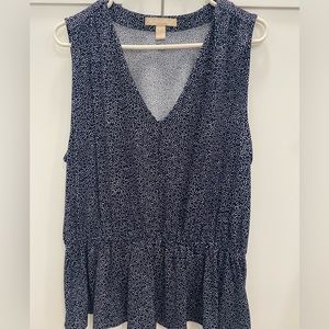Navy and white dotted sleeveless peplum top from Banana Republic.